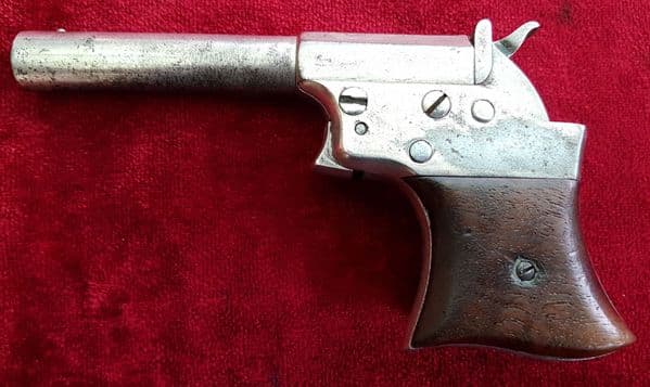 X X X  SOLD X X X Remington .41 rim-fire single shot derringer.  Good condition. Ref 9754.